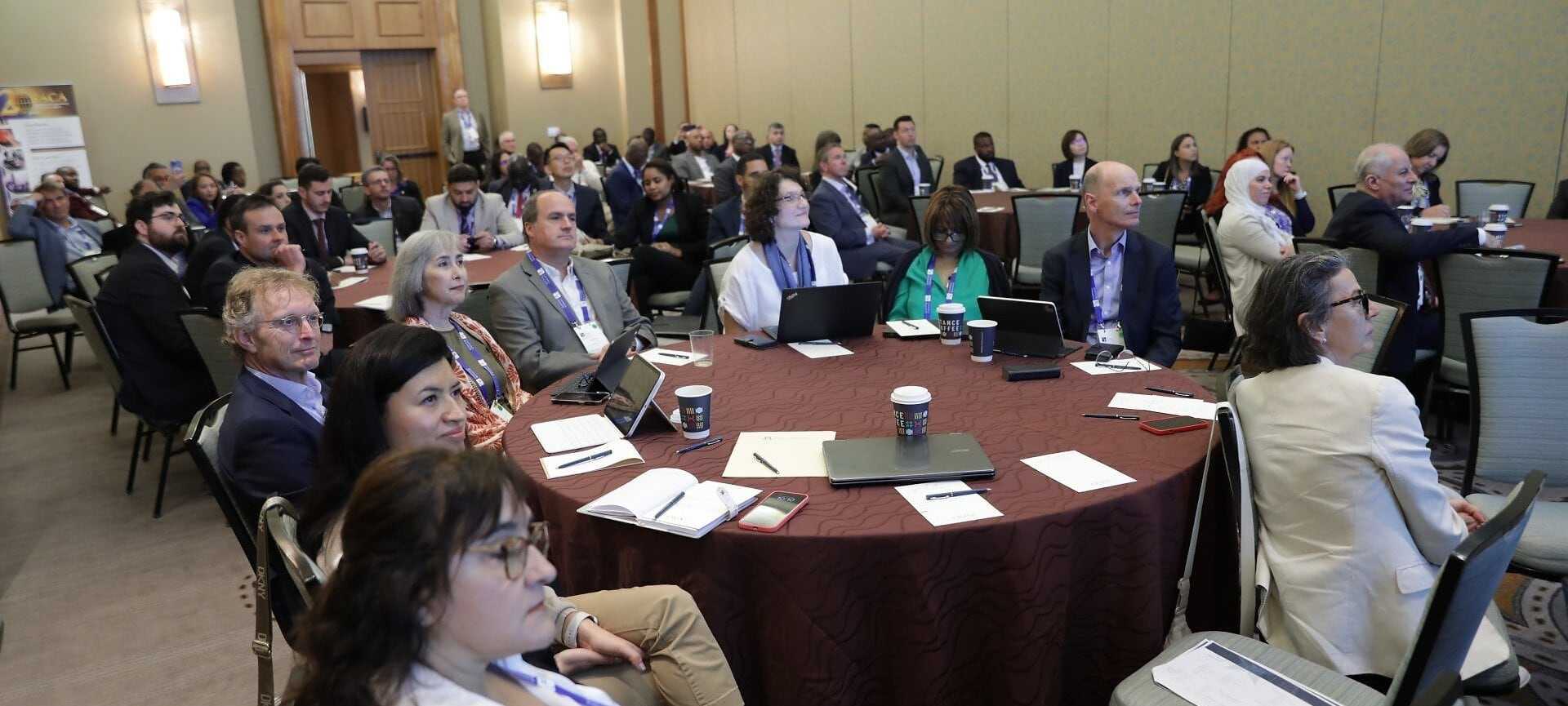 currency-research-finance-summit-photo-ai-building